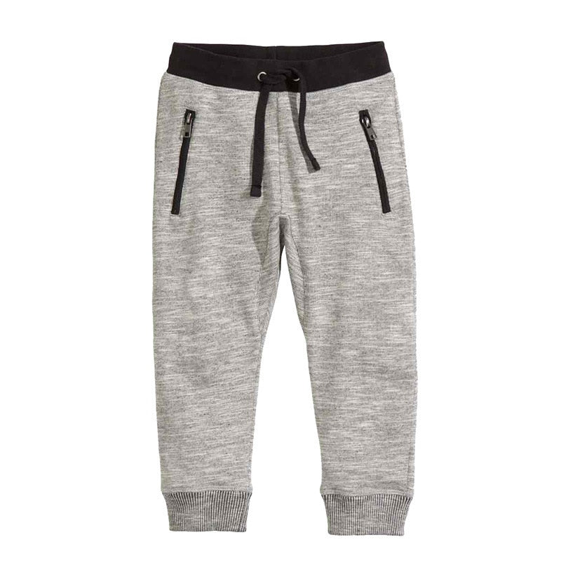 Gray heather jogger pants with black drawstring waist and side zip pockets, casual kids fashion