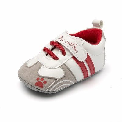 White baby sneaker with red laces, paw print, and 'Be walker' strap – soft sole first walker shoe