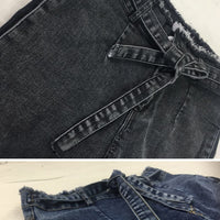 Black and blue denim shorts with frayed hem and tie waist, stylish women's fashion