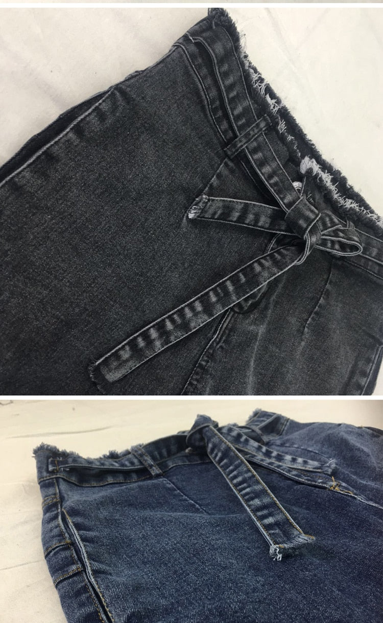 Black and blue denim shorts with frayed hem and tie waist, stylish women's fashion