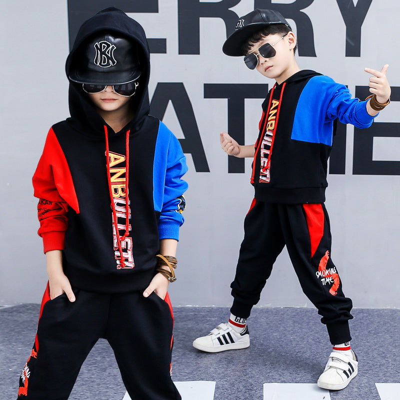 Kids in stylish color-block hoodies and joggers, urban streetwear fashion for boys