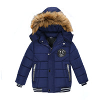Navy blue kids winter coat with faux fur hood, puffer design, and smiley patch for warmth and style