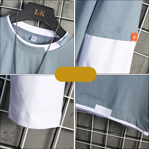 Light blue and white color-block t-shirt with LK hanger, featuring clean seams and orange brand tag