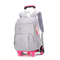 Gray rolling backpack with pink wheels and handle, ideal for school or travel