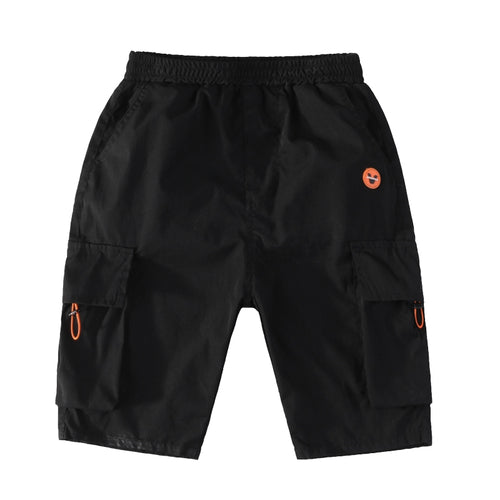 Black cargo shorts with orange alien patch and side pockets, stylish streetwear for men