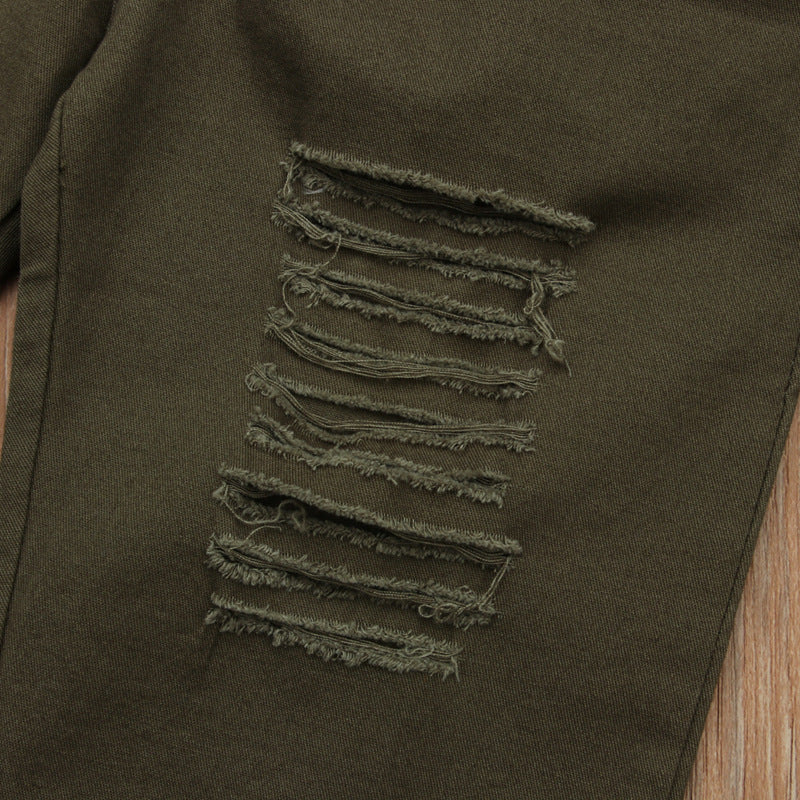 Olive green ripped jeans with distressed detailing for casual fashion