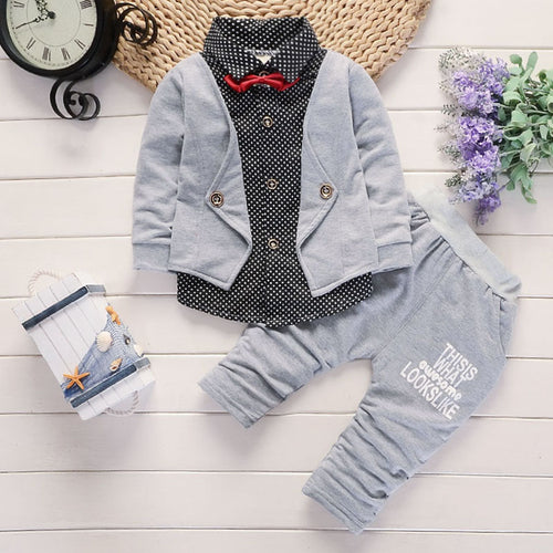 Baby boy outfit with gray blazer, polka dot shirt, red bow tie, and printed pants – stylish infant fashion set