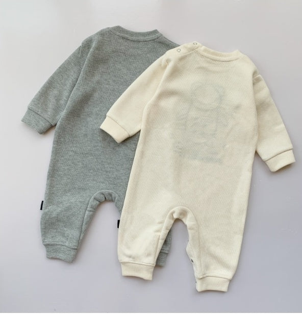 Soft baby rompers in gray and cream, cozy long-sleeve one-piece outfits for infants