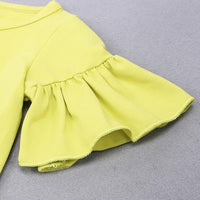 Bright yellow ruffled sleeve baby onesie, soft knit fabric with delicate trim, perfect for infant fashion