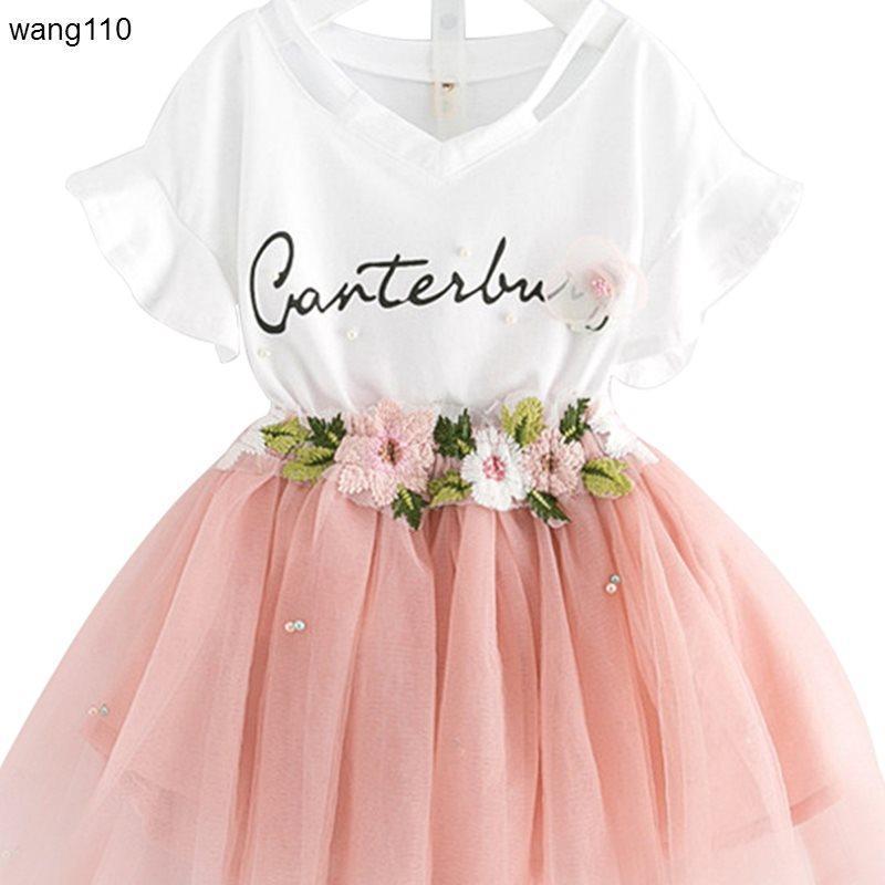 White V-neck dress with 'Canterbury' script, floral waistband, and pink tulle skirt for girls