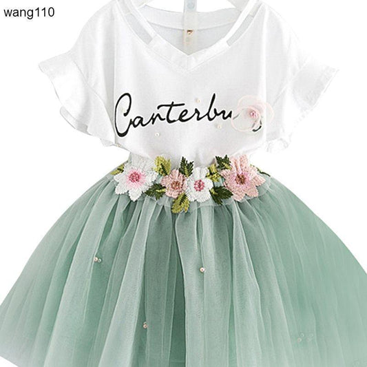 White V-neck kids dress with floral embroidery and mint tulle skirt, perfect for parties or casual wear