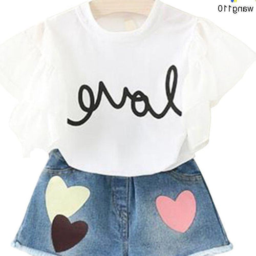 White 'love' graphic tee with ruffle sleeves and heart-patch denim shorts for kids