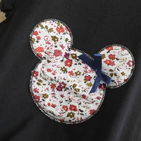 Black kids' shirt with floral Mickey Mouse appliqué and blue bow, cute Disney-inspired fashion