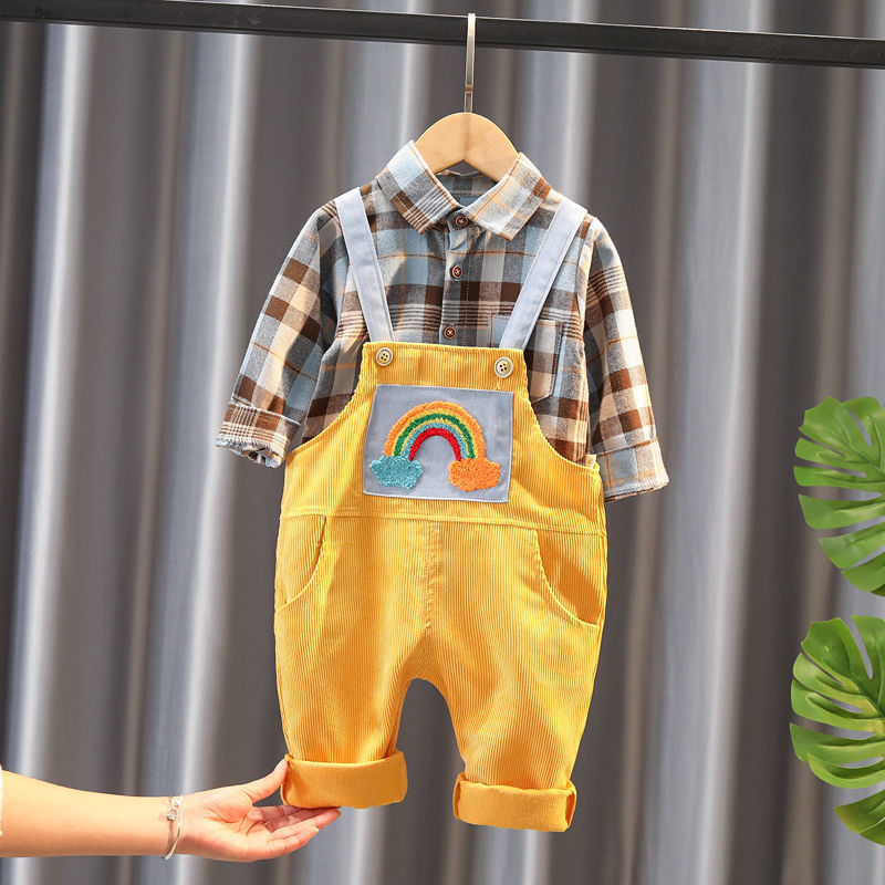 Baby boy outfit with plaid shirt and yellow corduroy overalls featuring rainbow embroidery, perfect for toddler fashion.