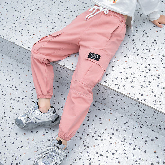 Teenager middle school students wearing Ancient Energy workwear leggings and trousers, suitable for elementary school children.
