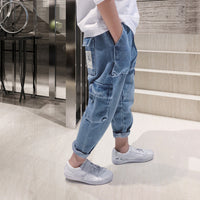 Big kids loose harem trousers and fleece padded overalls by Ancient Energy, featuring comfortable, relaxed fit and cozy design.