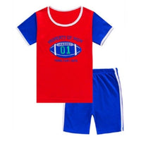 Children's boys' summer suit by Ancient Energy, featuring a lightweight, colorful outfit with a collared shirt and shorts for warm weather.