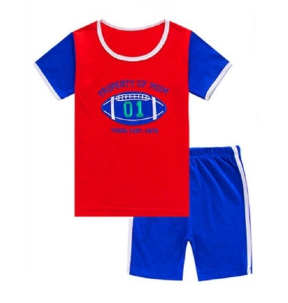 Children's boys' summer suit by Ancient Energy, featuring a lightweight, colorful outfit with a collared shirt and shorts for warm weather.