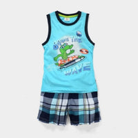 Young boy in Ancient Energy summer suit, children’s clothes, casual boys’ summer outfit with shorts and a t-shirt.