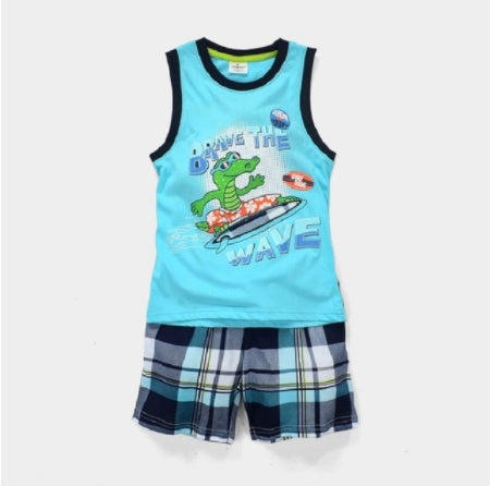Young boy in Ancient Energy summer suit, children’s clothes, casual boys’ summer outfit with shorts and a t-shirt.
