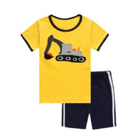 Young boy wearing a summer suit from Ancient Energy, children’s clothing and boys' summer clothes, casual outfit for warm weather.