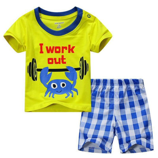 Children's boys' summer clothes suit by Ancient Energy, lightweight and casual outfit for kids, shown on a boy model.