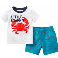 Children's boys' summer suit by Ancient Energy, featuring a lightweight, colorful outfit perfect for warm weather.