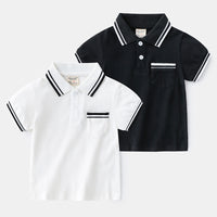 Boy wearing a summer polo shirt by Ancient Energy, featuring a classic design and comfortable fit for warm weather.