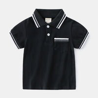 Boy wearing a summer polo shirt by Ancient Energy, featuring a casual boys' T-shirt with a classic polo design and short sleeves.