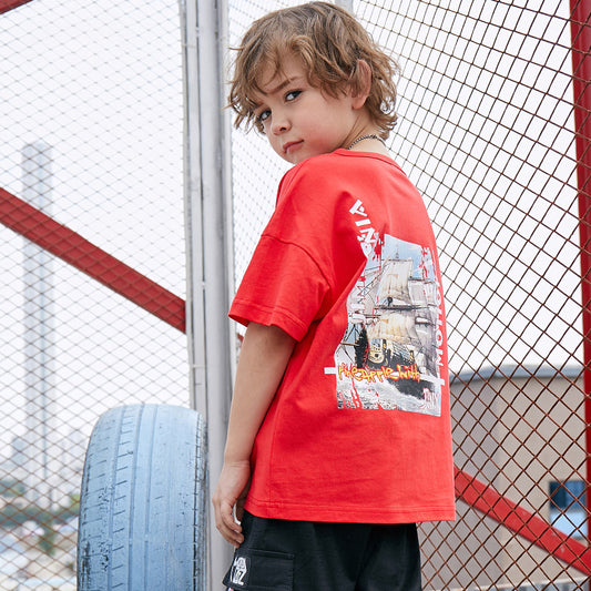 Children's printed T-shirt by Ancient Energy featuring colorful fun graphics on soft, comfortable fabric.