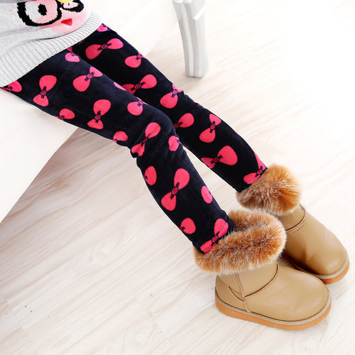 Girls' warm leggings by Ancient Energy, soft and cozy for winter, shown in a vibrant pink color with elastic waistband.