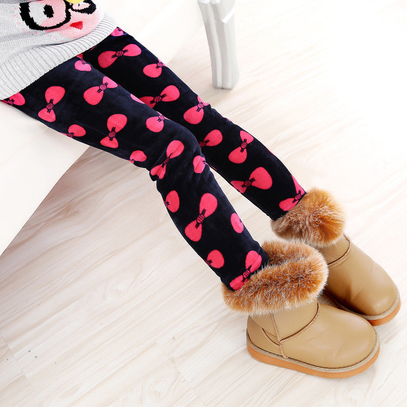 Girls' warm leggings by Ancient Energy, soft and cozy for winter, shown in a vibrant pink color with elastic waistband.