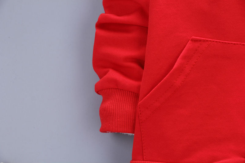 Children's three-piece clothing set from Ancient Energy, featuring colorful tops and pants, suitable for kids' casual wear.