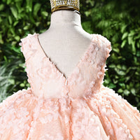 Baby girl dress for one-year-olds by Ancient Energy, pink with floral pattern and ruffled sleeves, suitable for special occasions.