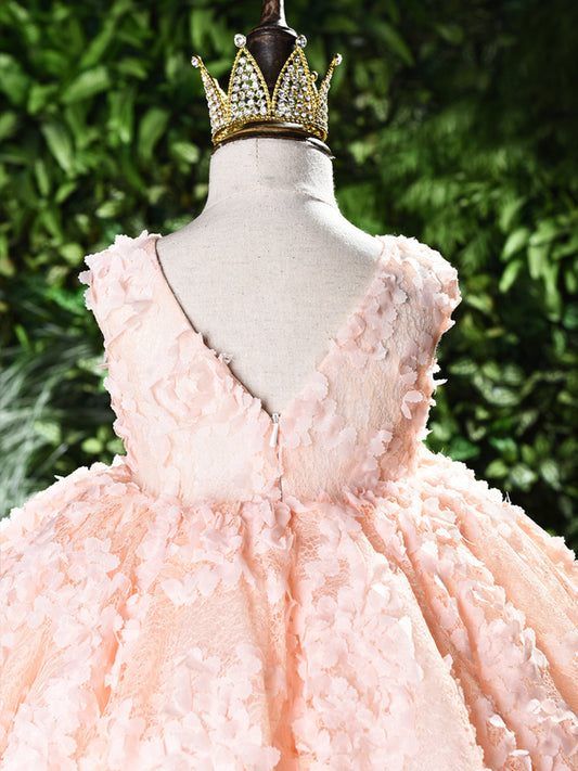 Baby girl dress for one-year-olds by Ancient Energy, pink with floral pattern and ruffled sleeves, suitable for special occasions.