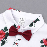 Two-piece summer baby set with flower-printed short sleeve polo shirt and red shorts, ideal school clothes for children.