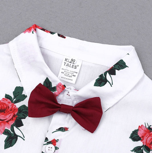 Two-piece summer baby set with flower-printed short sleeve polo shirt and red shorts, ideal school clothes for children.