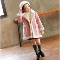 Children's winter clothing set by Ancient Energy, featuring warm jackets and cozy accessories for kids in cold weather.