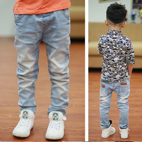Young boy wearing Ancient Energy boys' spring and autumn pants, featuring comfortable fabric and casual style.