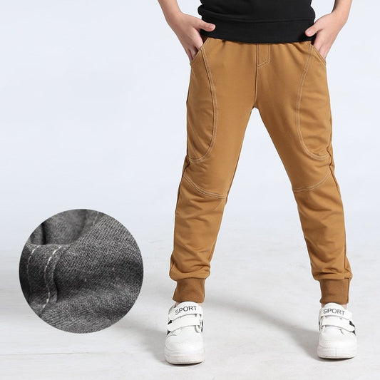 Boys' sports trousers by Ancient Energy, navy blue athletic pants with elastic waistband and side pockets, suitable for active wear.