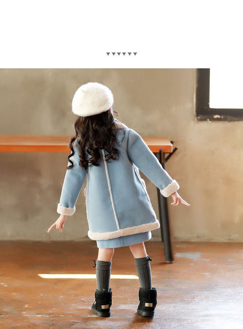 Winter children's clothing by Ancient Energy, featuring a cozy, warm outfit suitable for cold weather conditions.