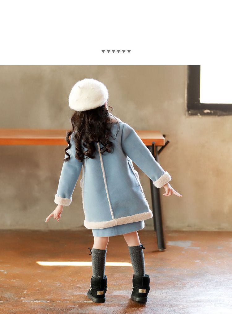 Winter children's clothing by Ancient Energy, featuring a cozy, warm outfit suitable for cold weather conditions.