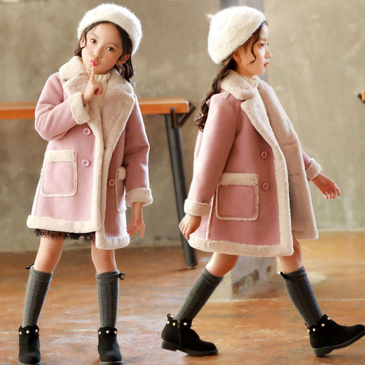 Children's winter clothing set by Ancient Energy, featuring a warm jacket, hat, and mittens for cold weather comfort.