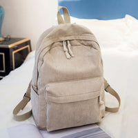 Ancient Energy corduroy backpack with shoulder straps, ideal for students, featuring a stylish school bag design.