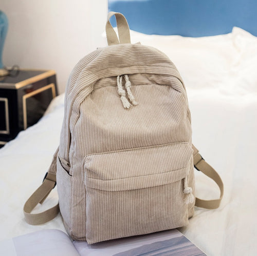 Ancient Energy corduroy backpack with shoulder straps, ideal for students, featuring a stylish school bag design.