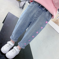 Girls' casual thin love stretch jeans by Ancient Energy featuring a slim fit and denim fabric, shown in a front view.