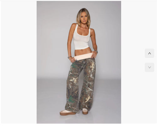 Loose-fitting straight-leg jeans by Ancient Energy with pockets, casual street-style trousers for women, relaxed and comfortable fit.