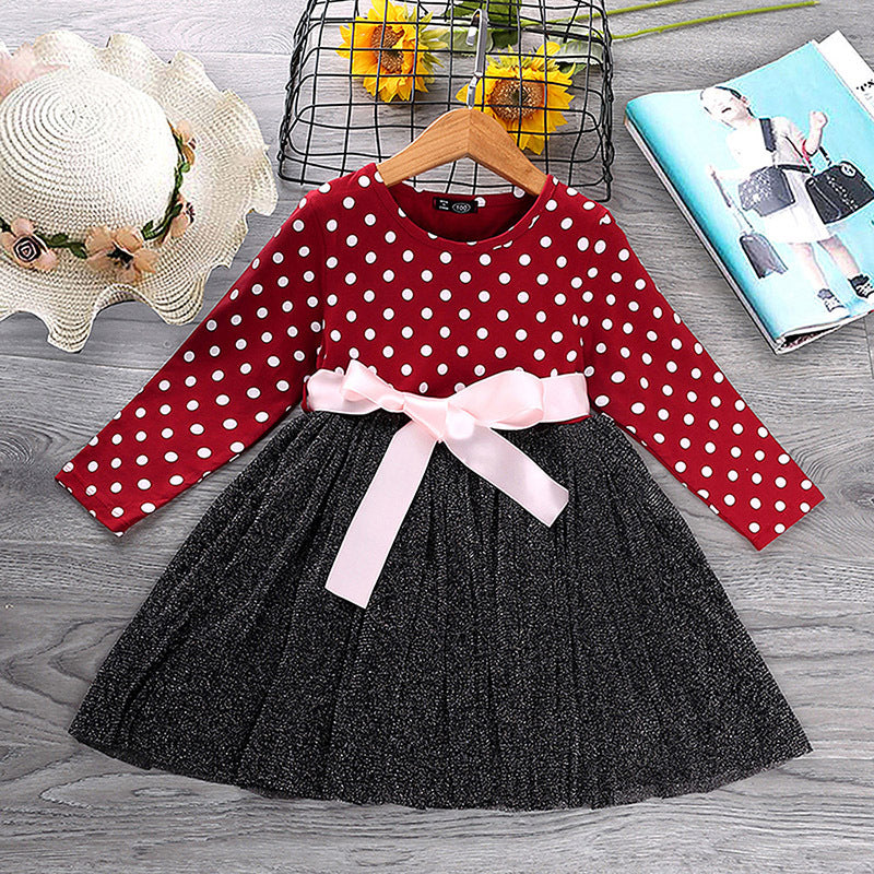 Ancient Energy polka dot princess dress for girls, featuring a cute, sleeveless design with a full skirt and bow accents.