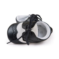 Ancient Energy baby shoes for boys with soft soles, ideal for walking and early mobility, in a comfy and lightweight design.
