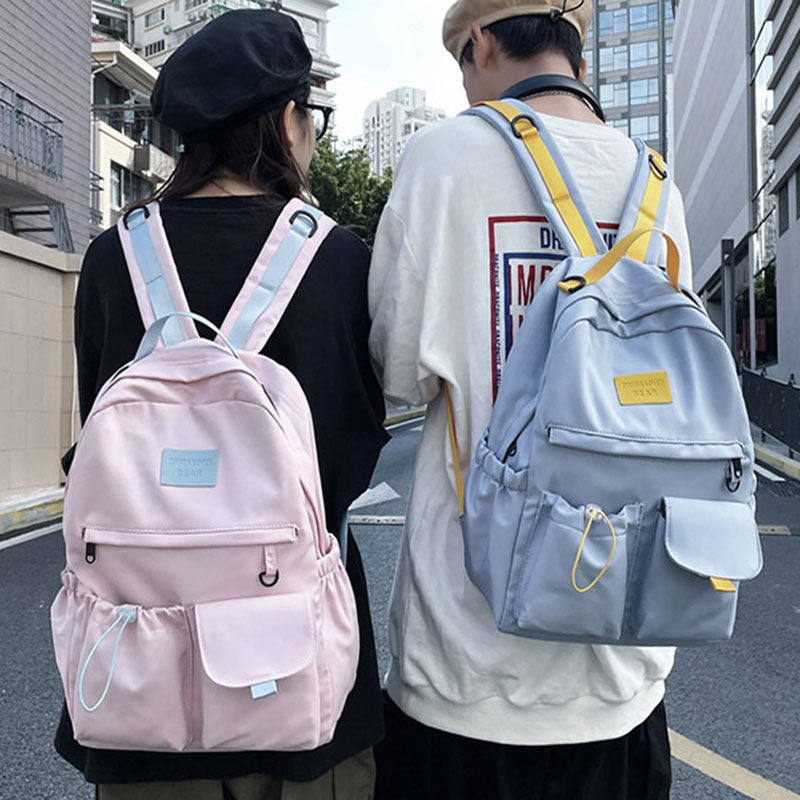 Ancient Energy nylon school backpack for junior high students, featuring multiple compartments and adjustable straps.